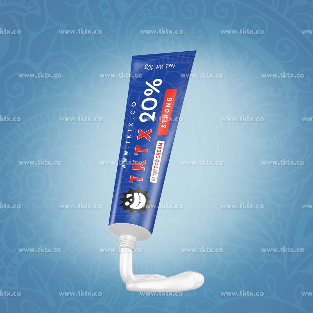 
                      
                        TKTX 20% Strong Numbing Tattoo Cream for pain relief in tattoos, piercings, and cosmetic procedures on a blue patterned background.
                      
                    